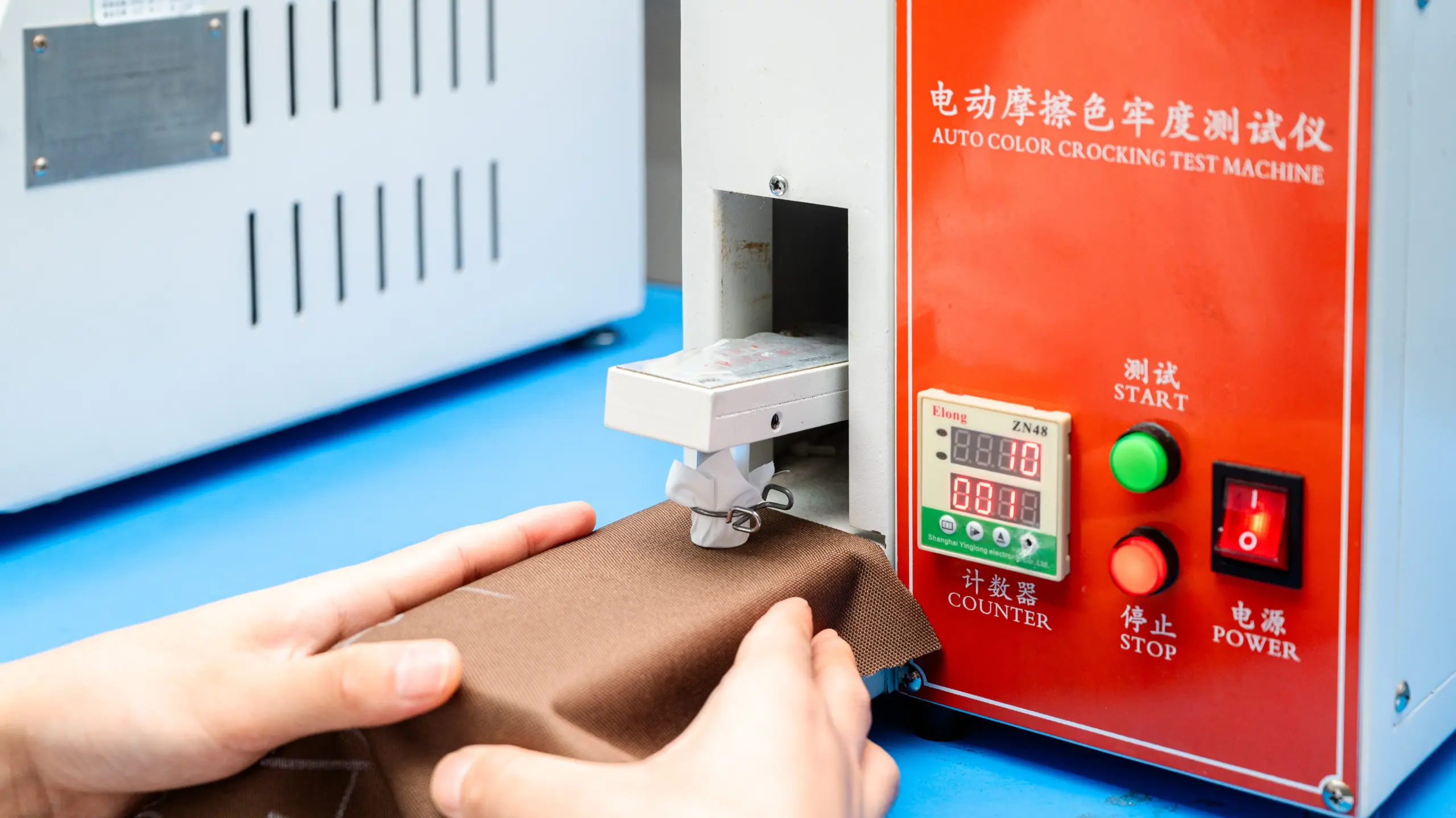 Fabric testing machine used to verify material safety for bag compliance