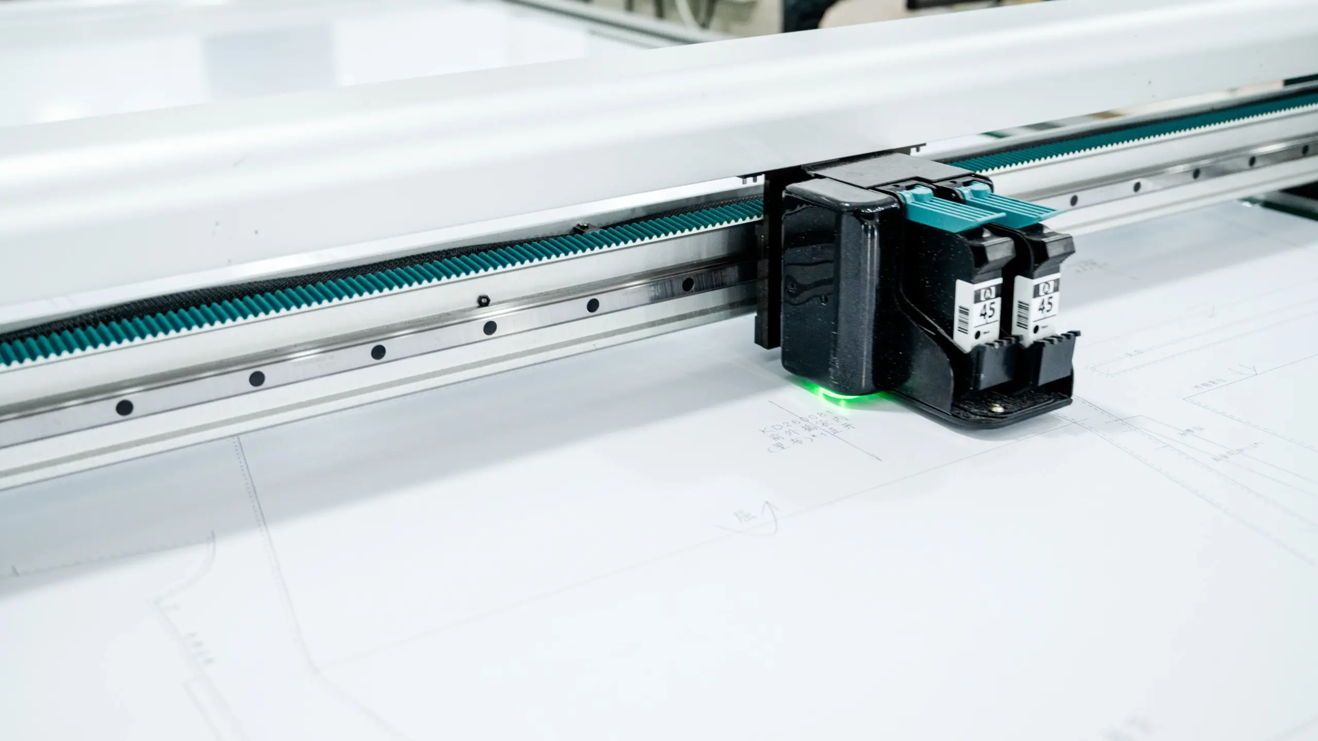 Automated cutting machine processing rolled fabric in a bag factory
