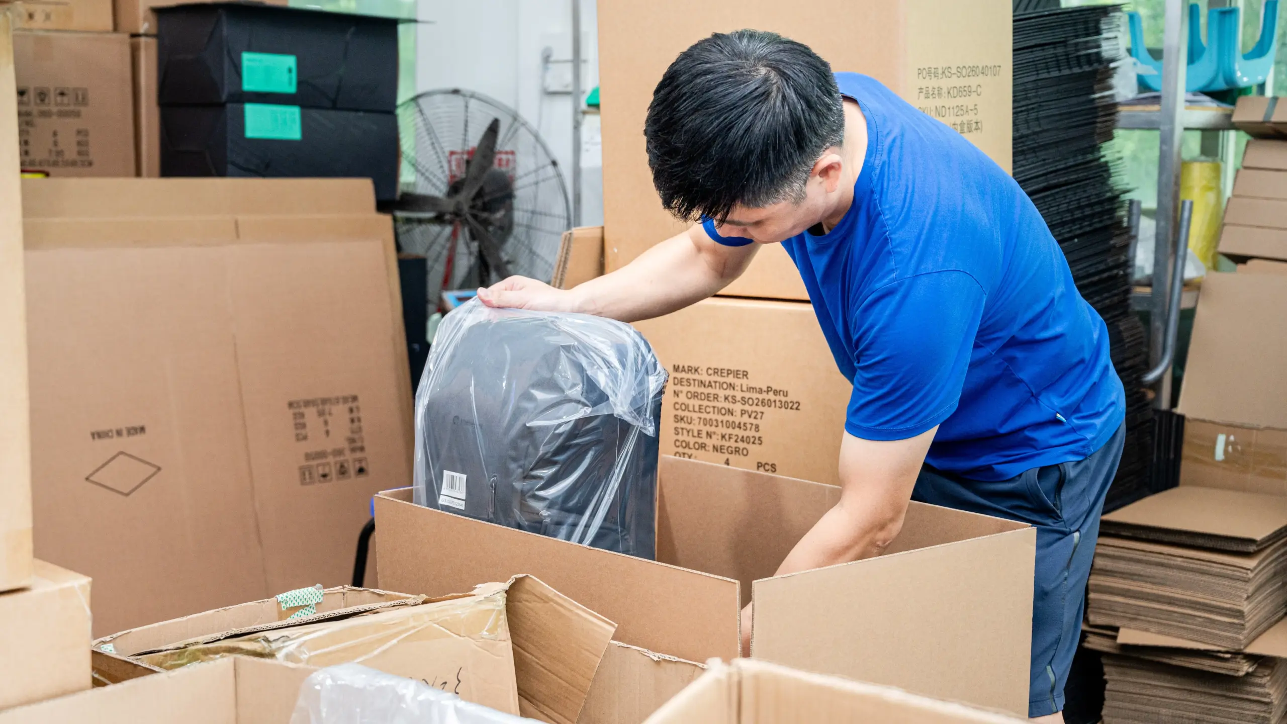 FSC-certified eco-friendly packaging boxes stacked in a bag factory