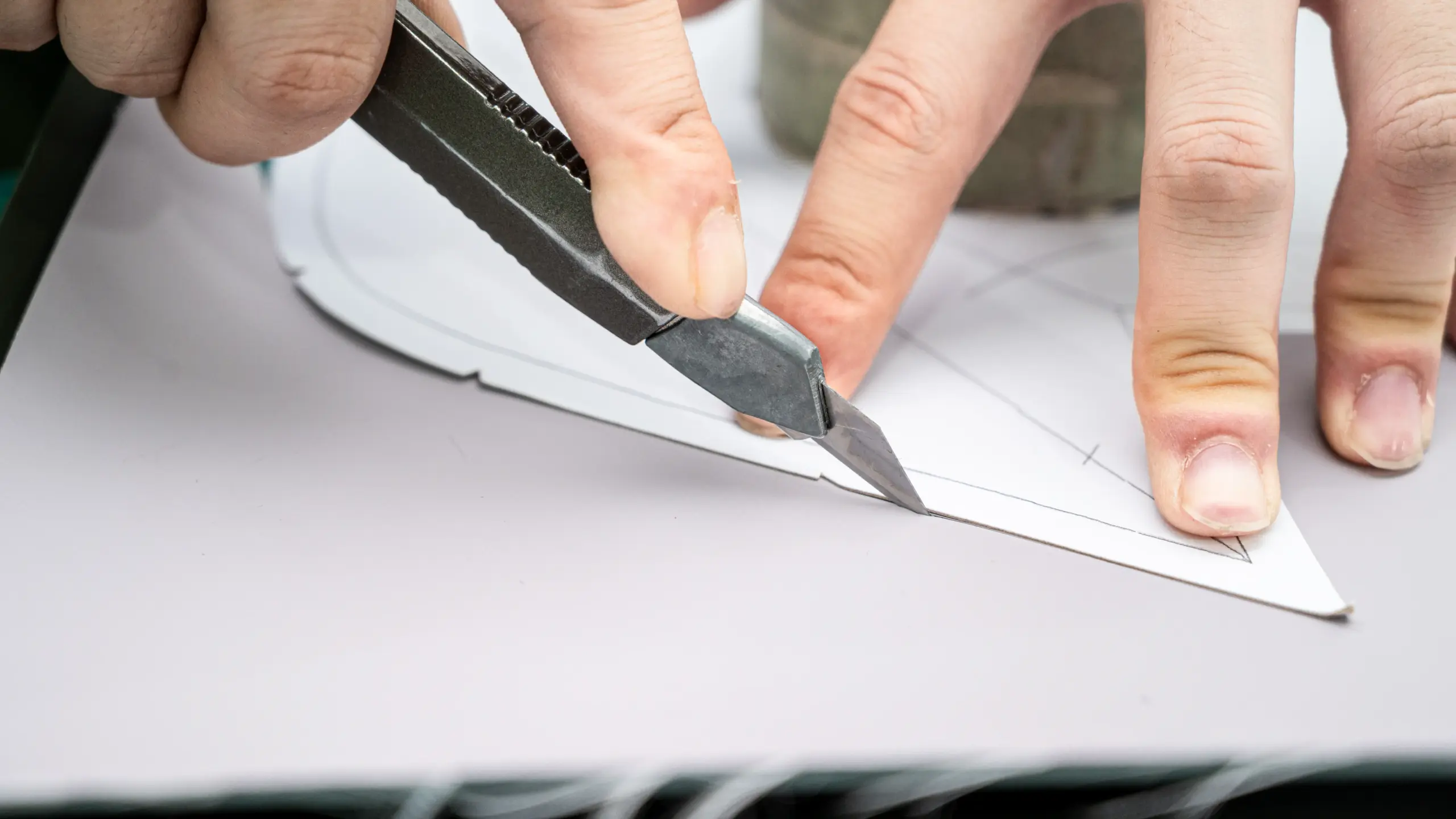 Technical pattern and paper cutting in custom handbag development