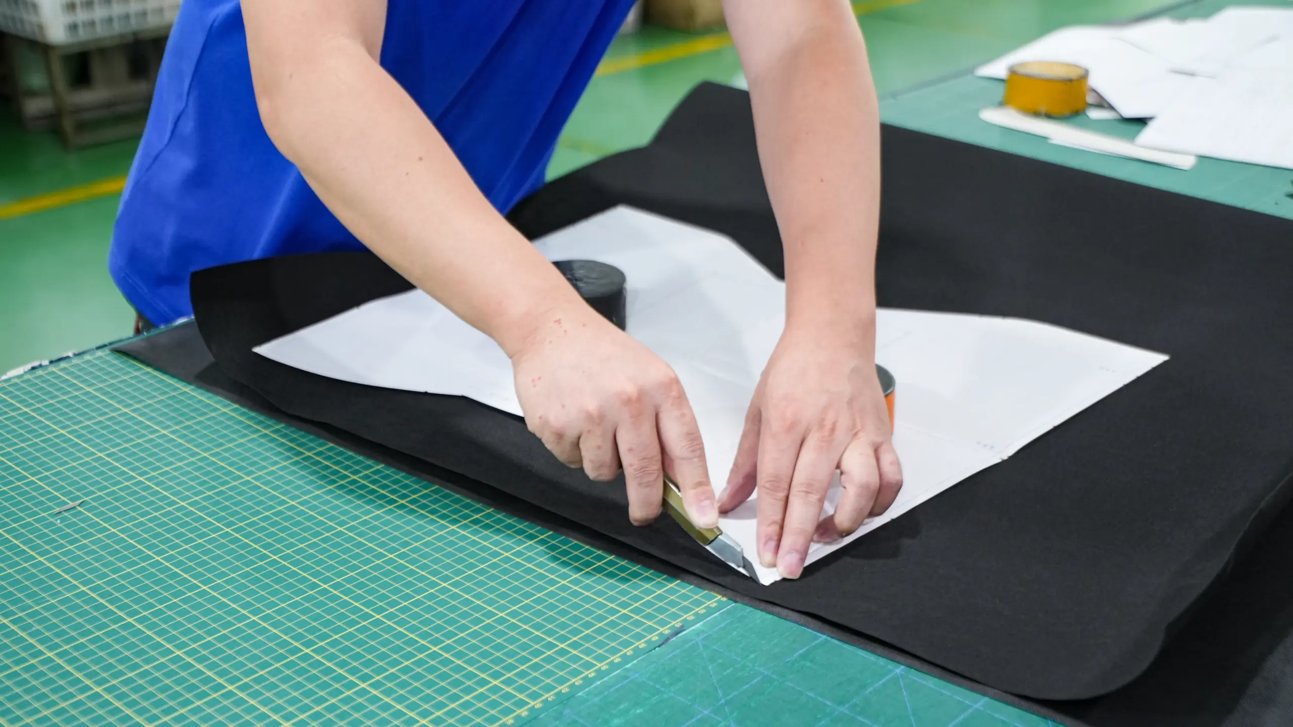 Precision cutting of premium handbag panels for consistent construction